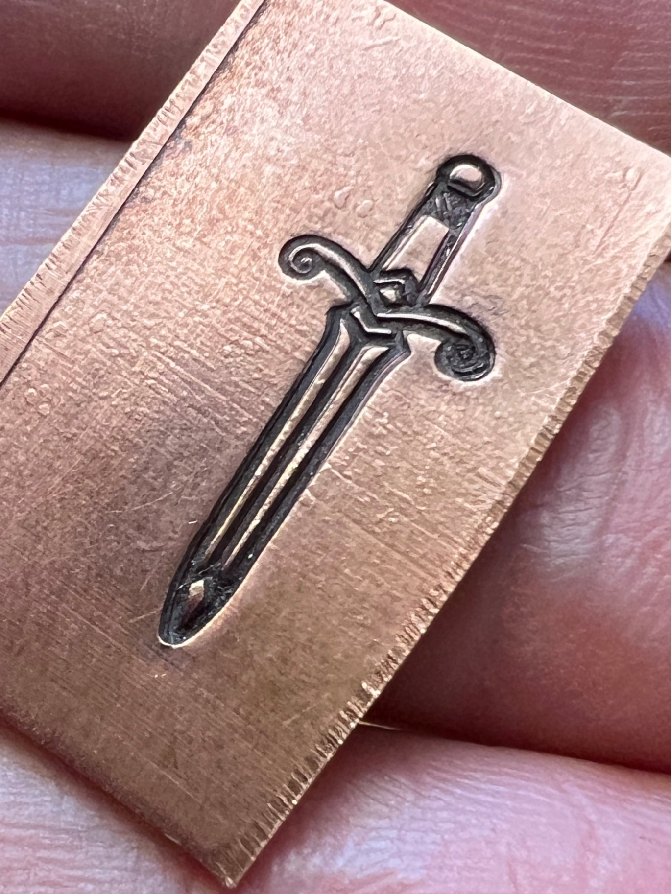 Sword stamp