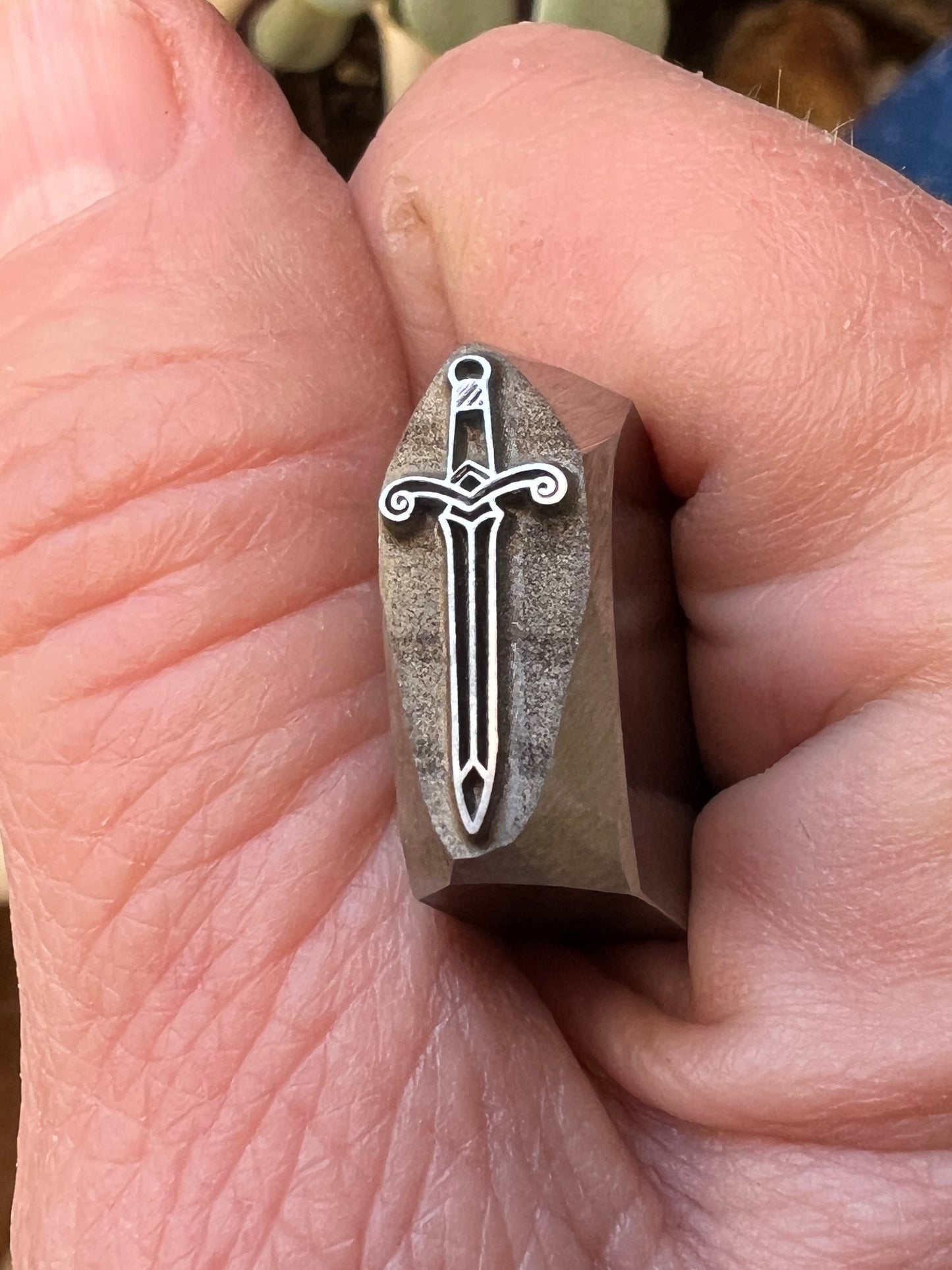 Sword stamp