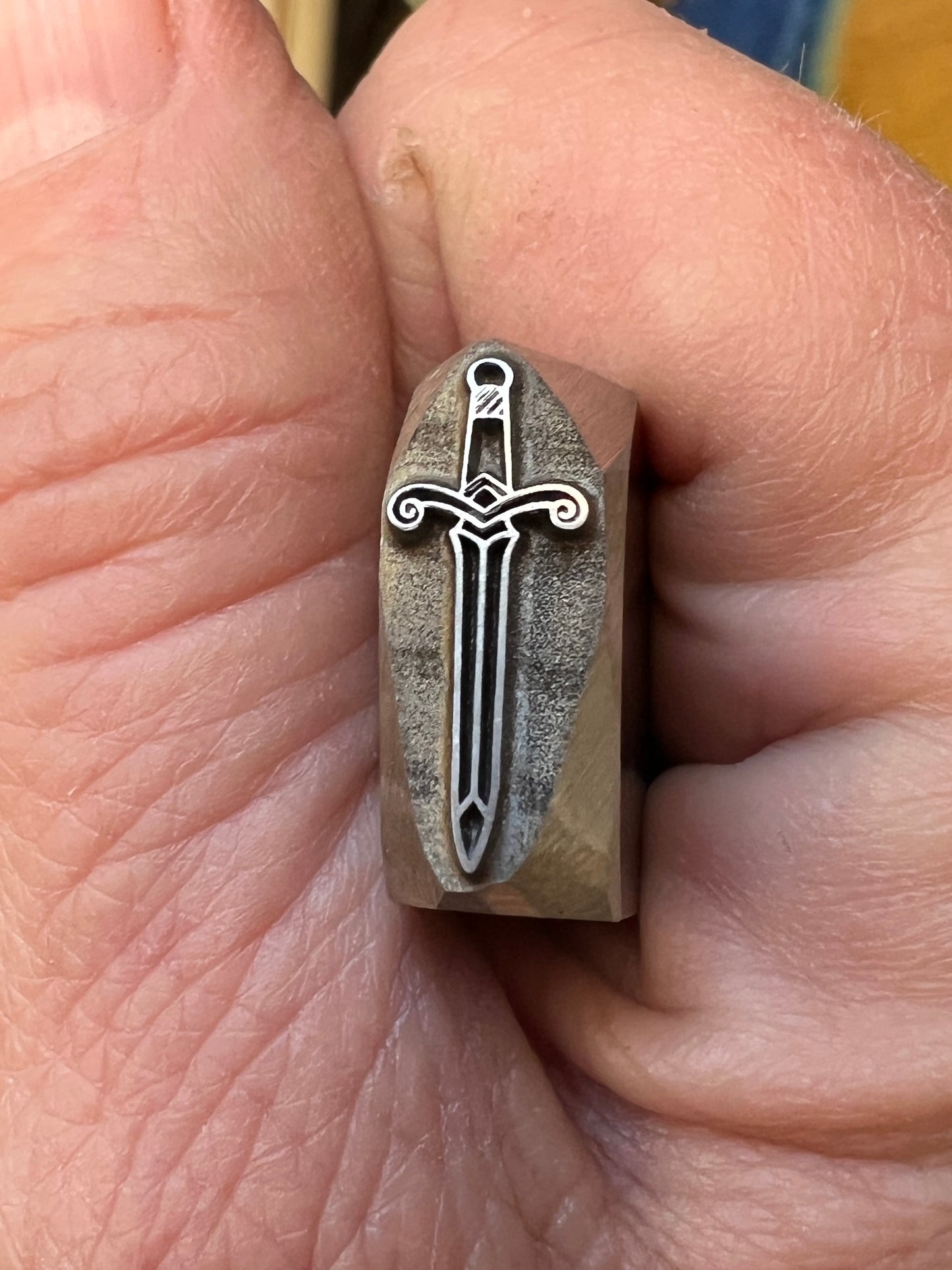 Sword stamp