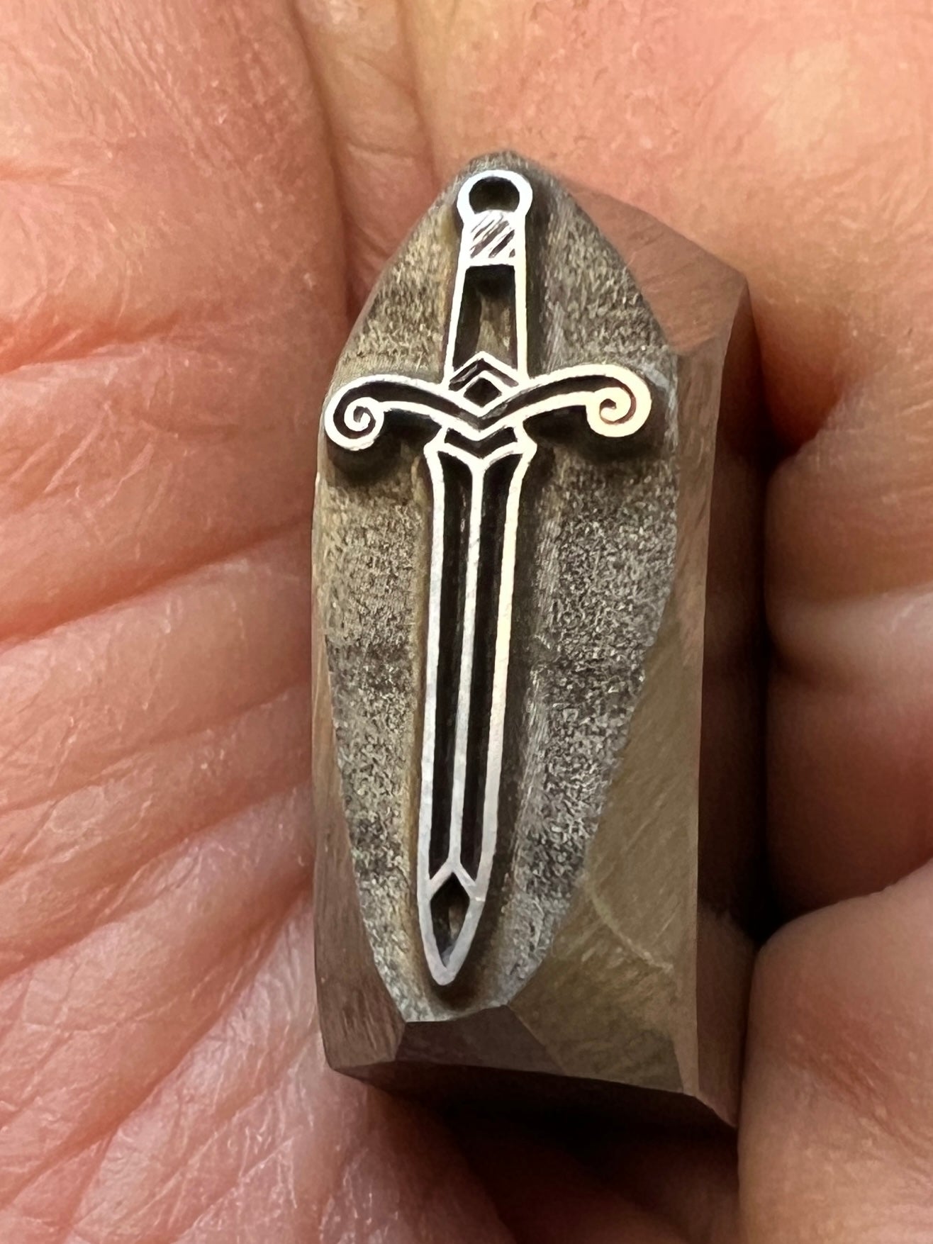 Sword stamp