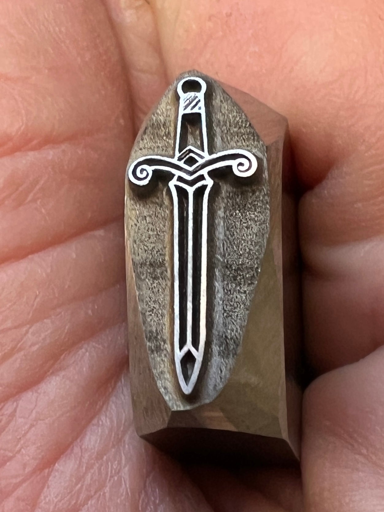 Sword stamp