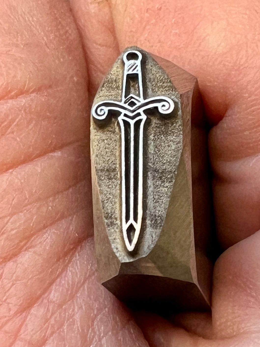 Sword stamp