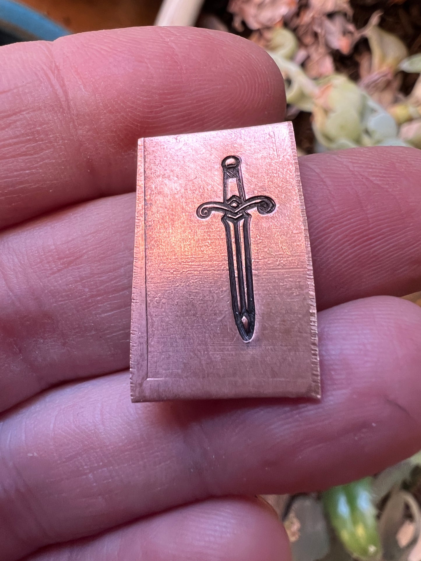 Sword stamp