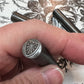 Scroll work shield (The Mitre)