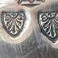 Scroll work shield (The Mitre)