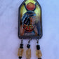 Isis enamel pendant